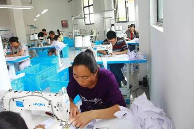 好消息!义乌衬衣来料加工项目落地汶川,近30万衬衣生产设备已就位!